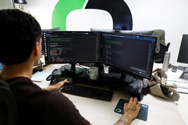 A programmer in Guernica, Spain, on Thursday, working on PHP code, software used throughout the internet.
