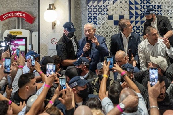 Benjamin Netanyahu, Israel’s prime minister, speaking to supporters in the food court of a shopping mall in Holon, Israel, during a campaign visit this month.